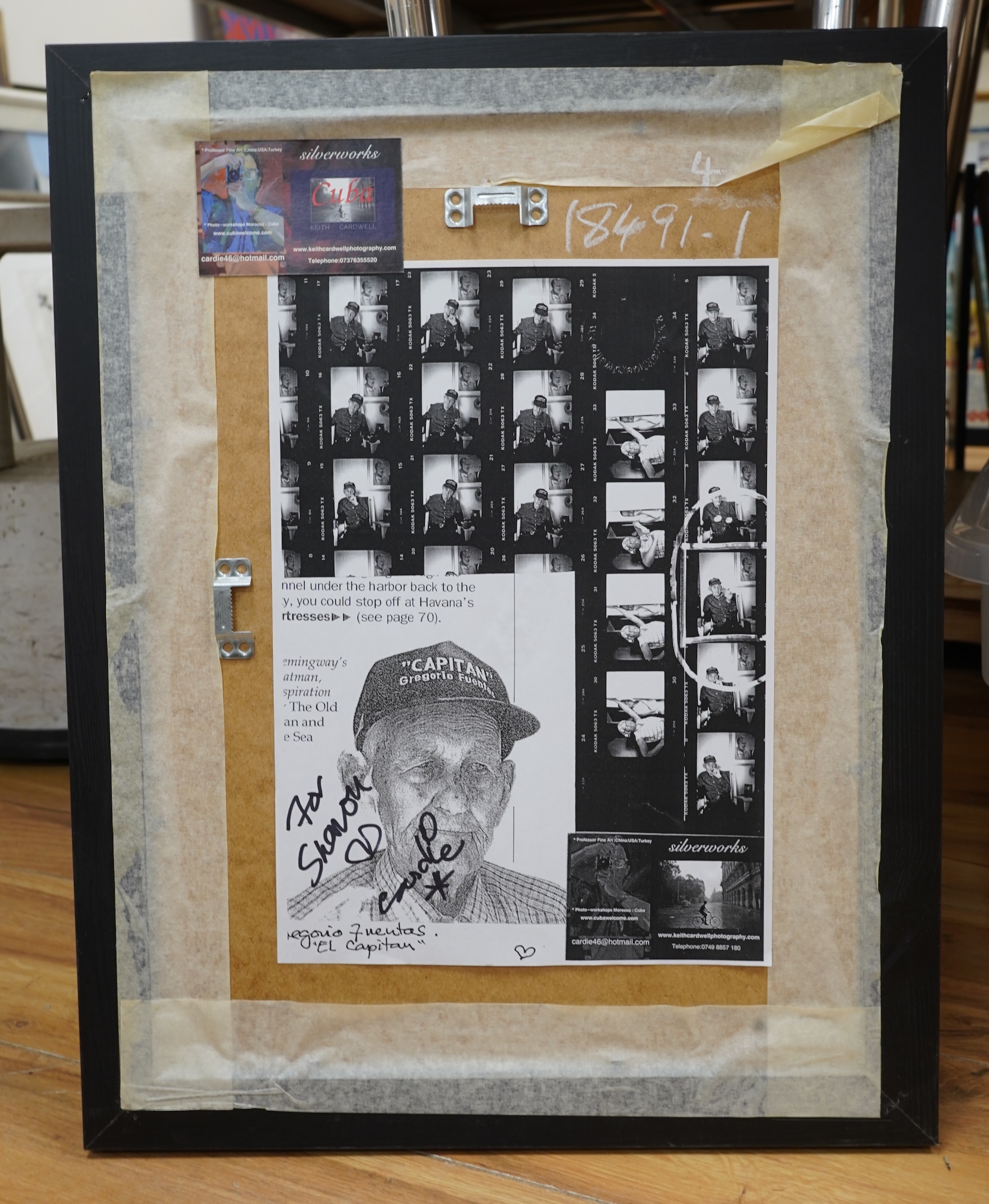 Keith Cardwell (Contemporary), Three gelatin silver prints to include ‘Old Man and the Sea, Cuba’, stamped, signed and titled in ink to the margin and ‘Korda with his Che’, stamped, largest 25 x 17cm, together with a boo